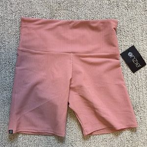Onzie Mauve ribbed biker shorts.